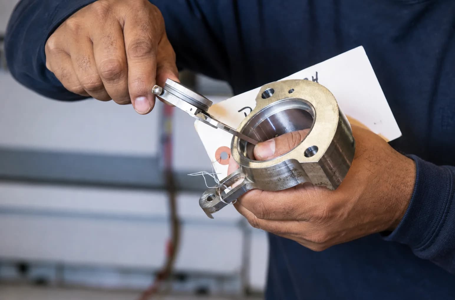 Measuring a machined ring component with a caliper
